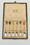 A CASED SET OF SIX SILVER COFFEE SPOONS, each polished spoon is set to the terminal with a semi-