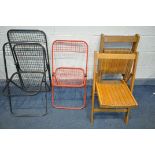 THREE METAL TALIN FOLDING CHAIRS, one red and two black coloured, along with three beech folding