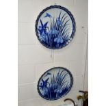 A PAIR OF LATE 19TH CENTURY JAPANESE BLUE AND WHITE PORCELAIN CHARGERS, wavy rims and fluted
