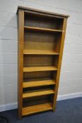 A TALL SOLID OAK OPEN BOOKCASE, with five adjustable shelves, width 85cm x depth 35cm x height 201cm