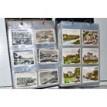 TWO ALBUMS OF CIGARETTE CARDS containing approximately 1035 cards in complete sets, part sets and '