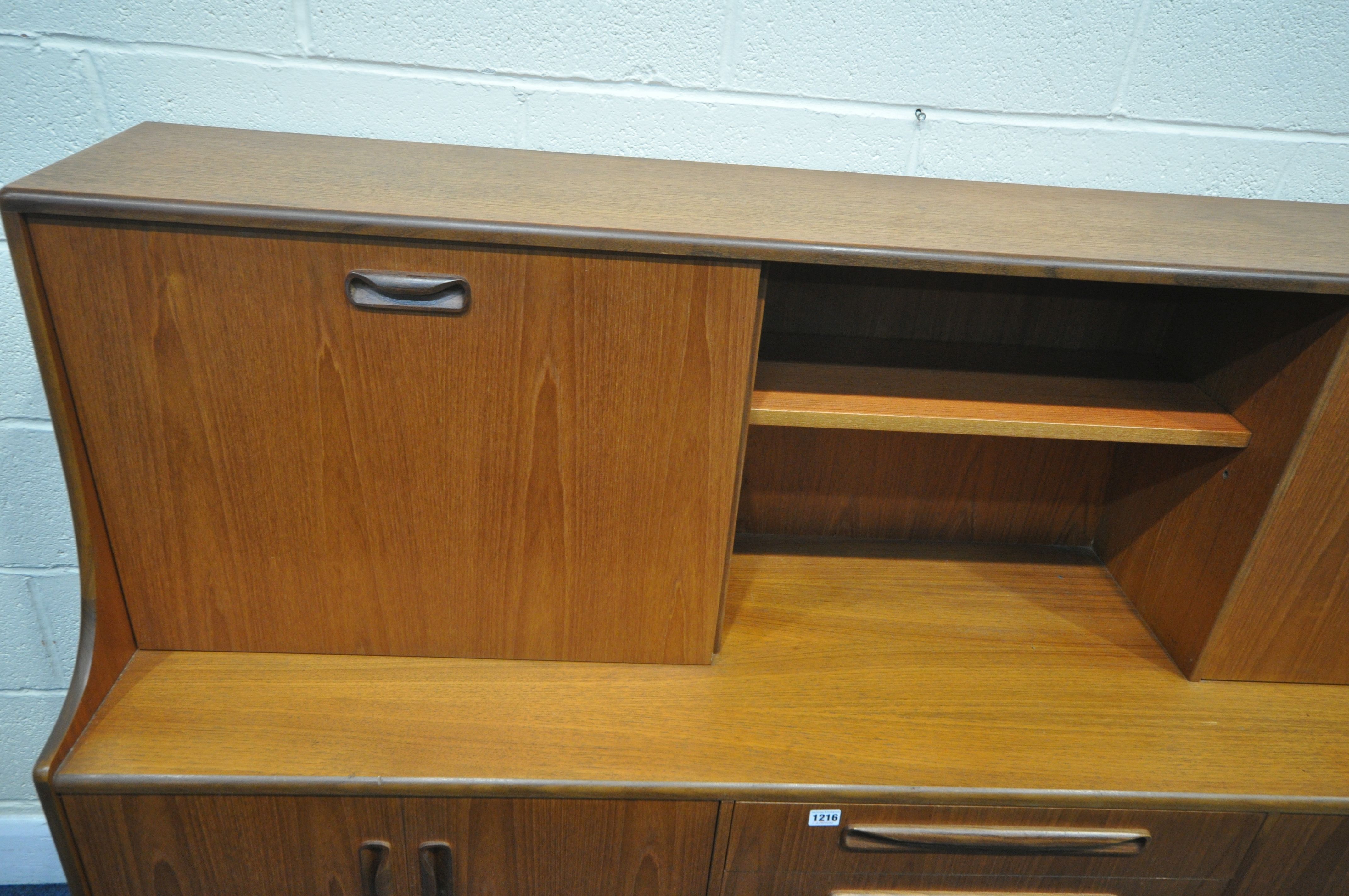 A MID CENTURY G PLAN FRESCO TEAK HIGHBOARD, upper section with a sliding door, and fall front - Image 2 of 7