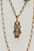 A 9CT GOLD RAG DOLL PENDANT AND CHAIN, articulated rag doll pendant, set with three rubies and