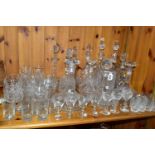 A COLLECTION OF CUT CRYSTAL AND OTHER GLASSWARES, over forty pieces to include twelve decanters: