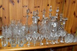 A COLLECTION OF CUT CRYSTAL AND OTHER GLASSWARES, over forty pieces to include twelve decanters: