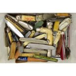 A PLASTIC BOX OF ASSORTED FRUIT AND POCKET KNIVES, used conditions, stainless steel, some with