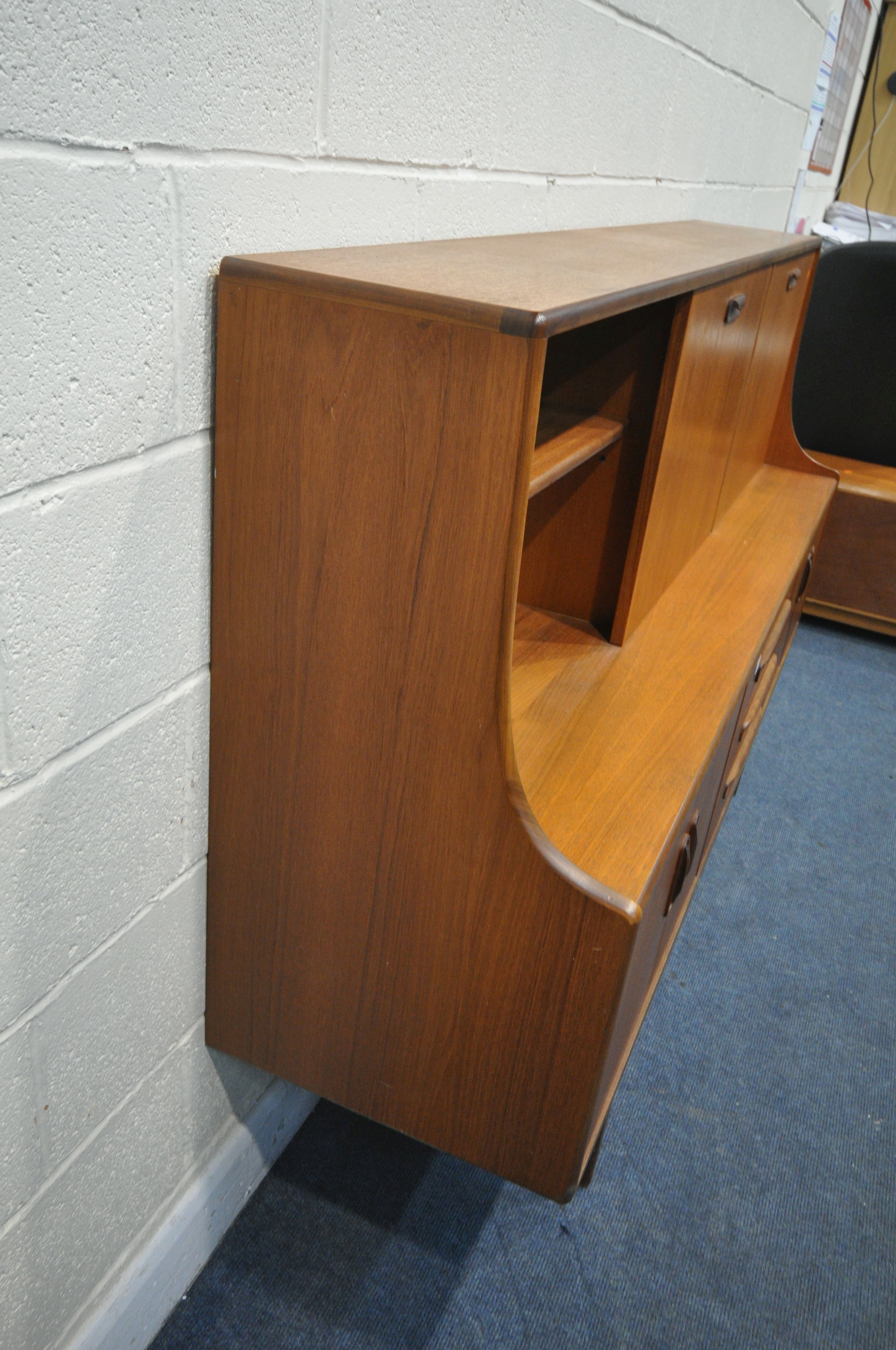 A MID CENTURY G PLAN FRESCO TEAK HIGHBOARD, upper section with a sliding door, and fall front - Image 7 of 7