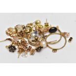 A BAG OF ASSORTED YELLOW METAL EARRINGS, to include eleven pairs of stud earrings and a pair of