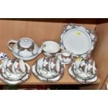 A CROWN DUCAL TWENTY TWO PIECE TEA SET IN THE ORANGE TREE PATTERN A1211, comprising tea pot, milk