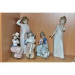 FIVE NAO FIGURES OF CHILDREN, comprising seated girl with puppies, girl on stool with puppy, girl