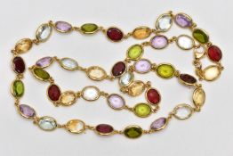 AN 18CT YELLOW GOLD, MULTI GEM SPECTACLE SET NECKLACE, designed as a series of oval cut gemstones