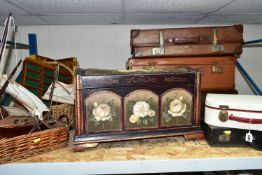 A GROUP OF VINTAGE SUITCASES, comprising three large brown suitcases, a cream vanity case, black