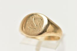 A GENTS 9CT GOLD SIGNET RING, rounded square form with worn initial engraving, polished band,