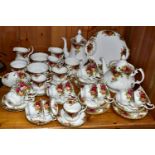 A FIFTY PIECE ROYAL ALBERT OLD COUNTRY ROSES TEA SET ETC, comprising a teapot, a coffee pot, a