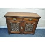 A 20TH CENTURY WALNUT DRESSER BASE, with two drawers, above two cupboard doors, with foliate