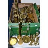 A BOX AND LOOSE BRASS WARES, to include a set of scales with eight weights recessed into the base, a