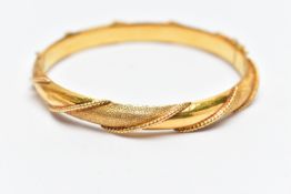 A MODERN ASIAN HINGED BANGLE, approximate inner diameter 61mm, stamped 916, tested and assessed as