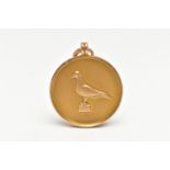 A 9CT GOLD FOB MEDAL, of a circular form, depicting a pigeon to the front, reverse has a personal