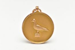A 9CT GOLD FOB MEDAL, of a circular form, depicting a pigeon to the front, reverse has a personal