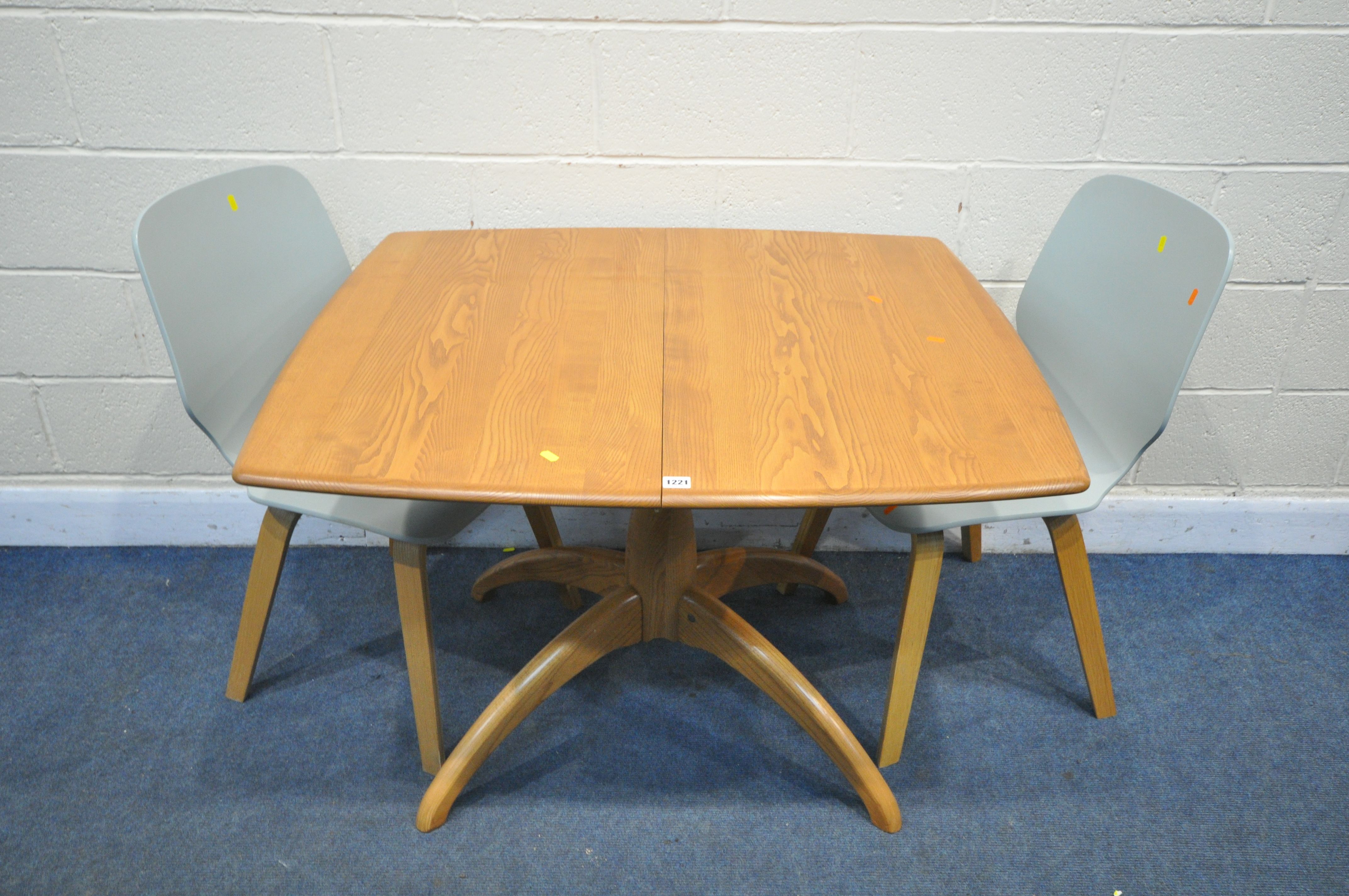 AN ERCOL BLONDE ELM WINDOR EXTENDING DINING TABLE, with a single fold out leaf, on a single pedestal - Image 2 of 4