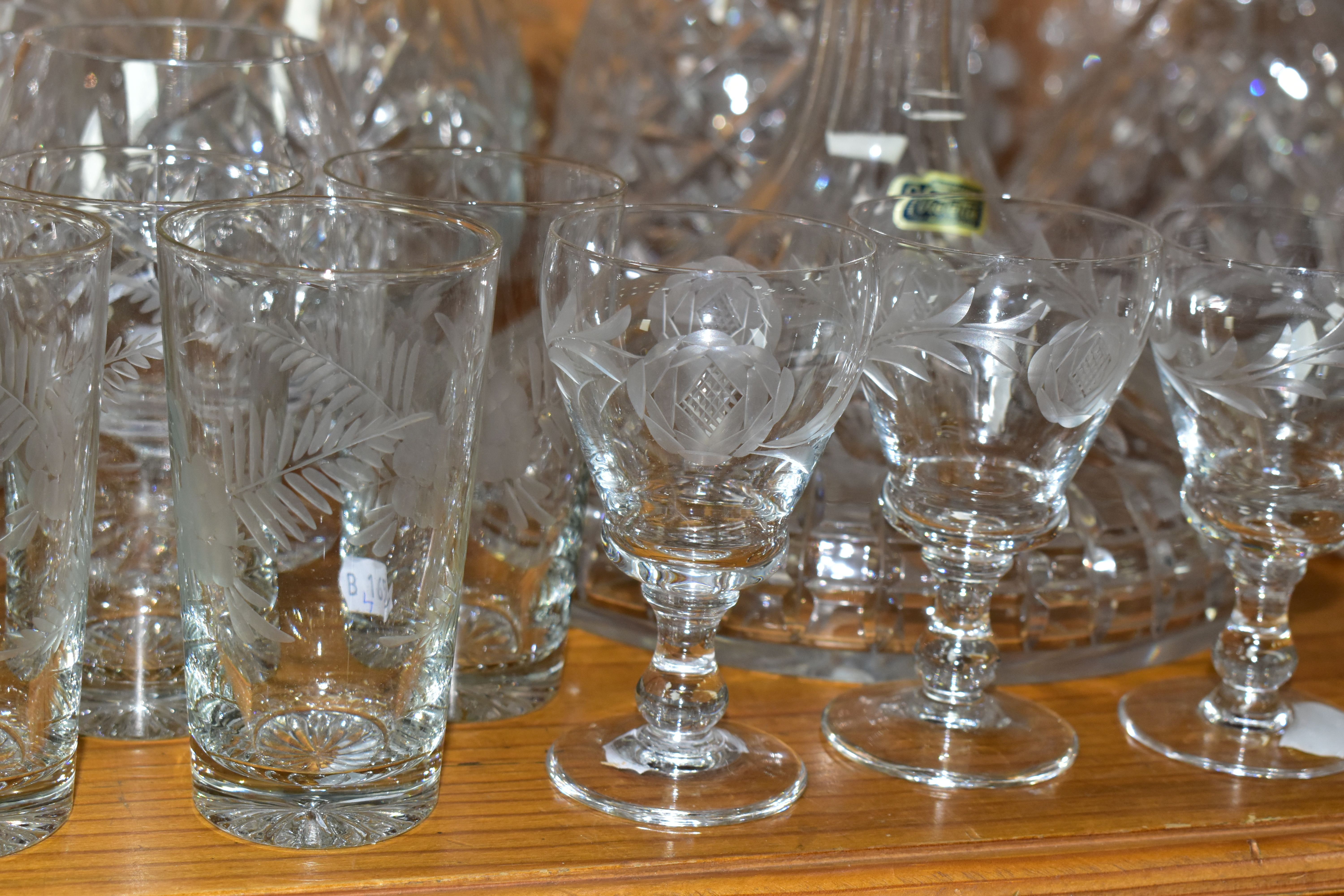 A COLLECTION OF CUT CRYSTAL AND OTHER GLASSWARES, over forty pieces to include twelve decanters: - Image 7 of 8
