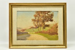 JOHN HAGGIS (1897-1968) A LANDSCAPE VIEW ALONG A PATH WITH TREES, signed bottom left, oil on