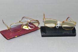 TWO PAIRS OF CARTIER PRESCRIPTION GLASSES, both with gold plated frames, sizes 54 - 20 and 58 -