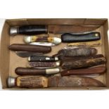 ASSORTED POCKET KNIVES, some fitted with antler handles with additional attachments, an antler