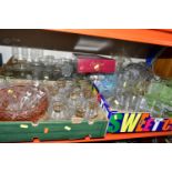 FOUR BOXES OF COLOURED AND PRESSED GLASSWARE, comprising a green dressing table vanity set, sundae