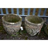 A PAIR OF WEATHERED COMPOSITE CIRCULAR PLANTERS, diameter 41cm x height 39cm (condition:-no apparent