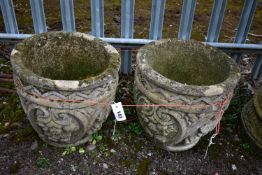 A PAIR OF WEATHERED COMPOSITE CIRCULAR PLANTERS, diameter 41cm x height 39cm (condition:-no apparent