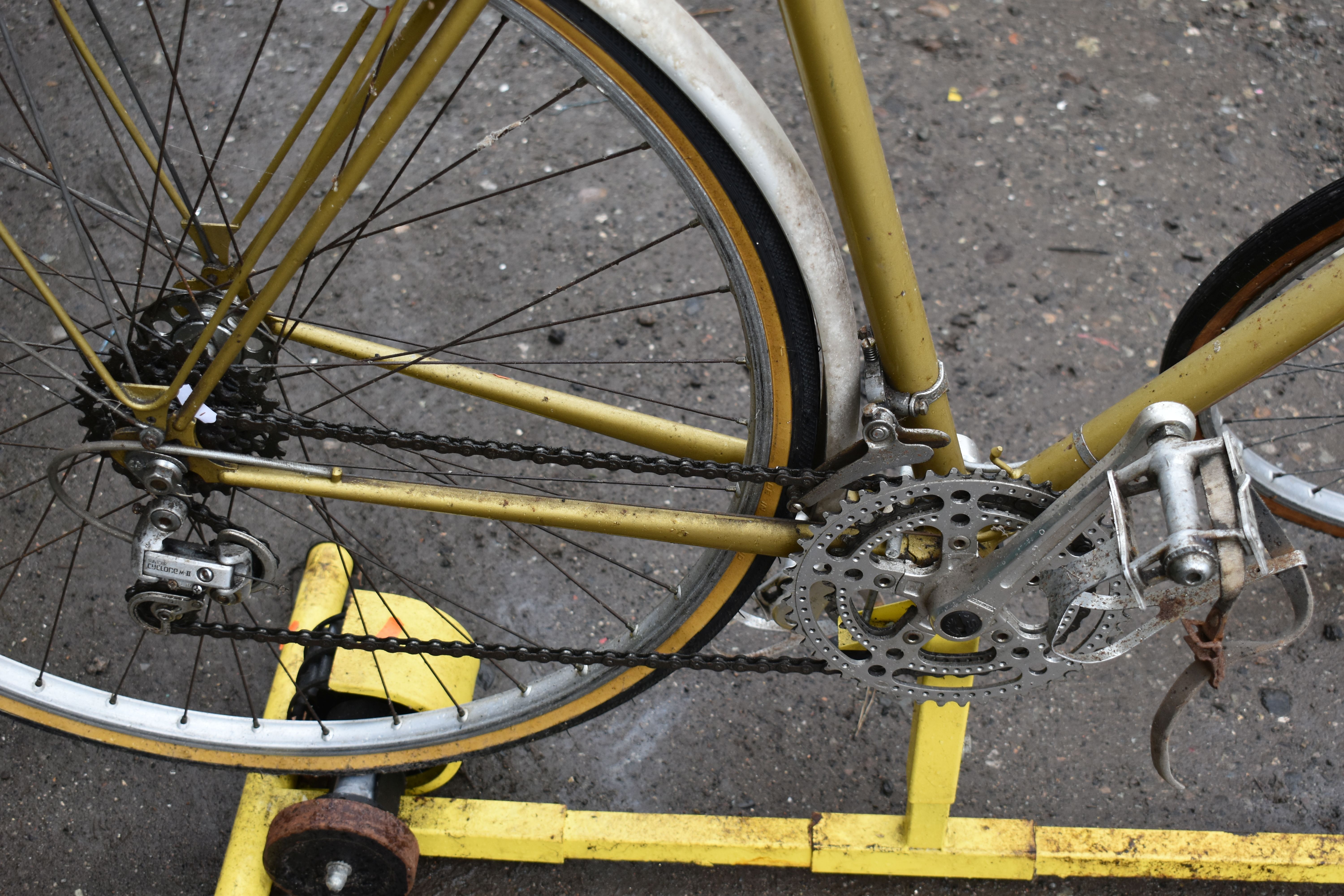 A VINTAGE RACING BIKE STAMPED C.B. LONDON TO FRONT BADGE mounted to an Ultech static frame, front - Image 3 of 3