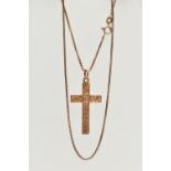 A 9CT GOLD PENDANT AND CHAIN, a rose gold cross pendant with floral and foliage engraved detail,
