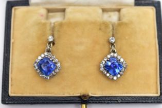 A PAIR OF EARLY 20TH CENTURY SAPPHIRE AND DIAMOND EARRINGS, each earring set with a cushion cut