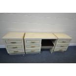 A CREAM FOUR PIECE BEDROOM SUITE, comprising a dressing table, with three drawers, length 107cm x