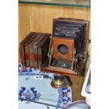 AN IMPERIAL INSTANTOGRAPH FIELD CAMERA in mahogany and brass, fitted with a J Lancaster and Sons