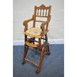 A LATE VICTORIAN WALNUT METAMORPHIC BABY'S HIGH CHAIR / ROCKING CHAIR, stamped to the rear of the