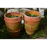 A PAIR OF TALL WEATHERED TERRACOTTA PLANTERS, diameter 36cm x height 50cm (condition:-chips to outer