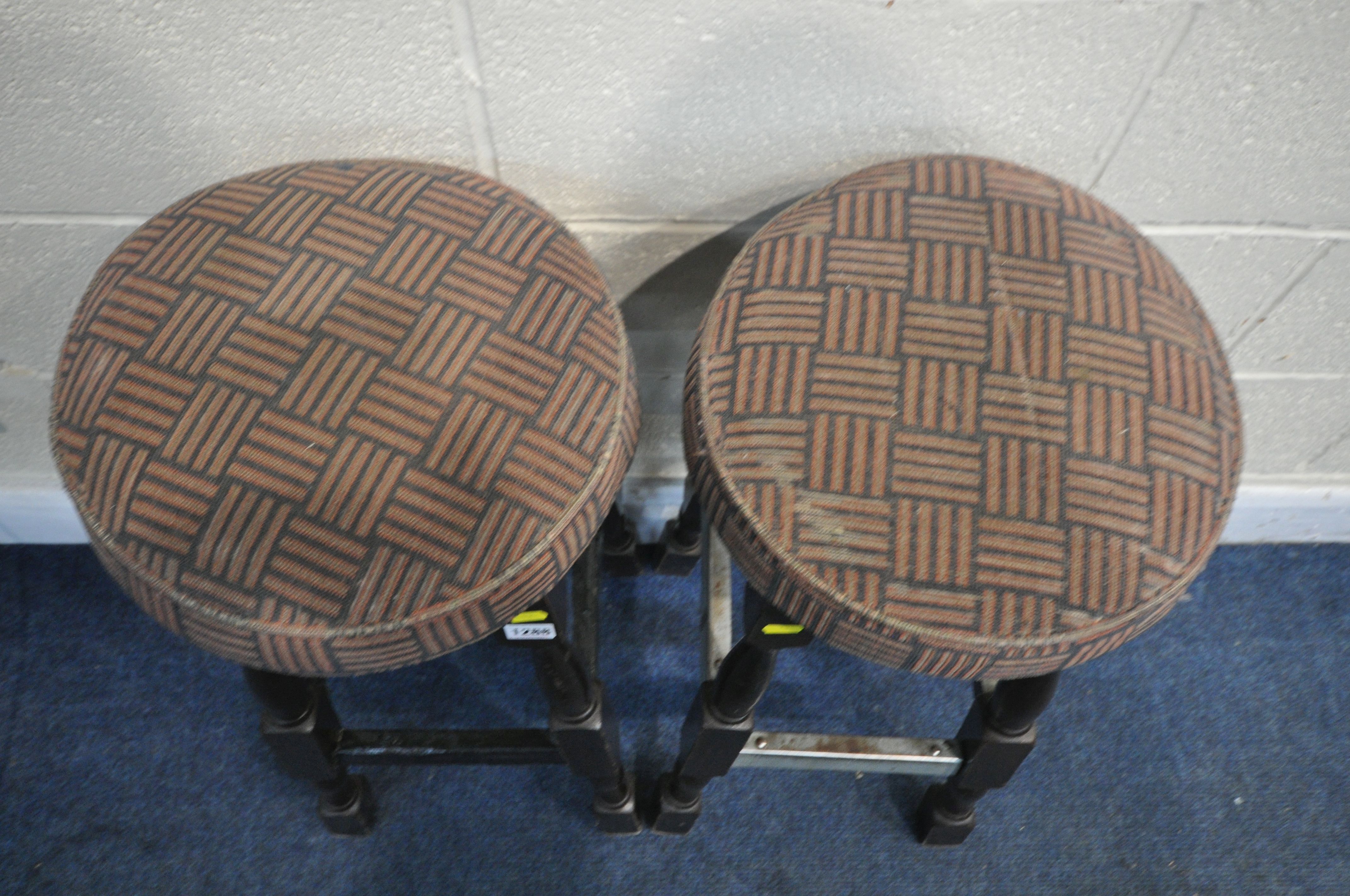 A PAIR OF 20TH CENTURY PUB STOOLS, height 77cm (condition - worn upholstery, heavily stained, one - Image 2 of 3