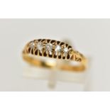 A FIVE STONE DIAMOND RING, five old cut diamonds prong set in yellow metal, stamp rubbed, ring
