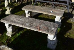 A PAIR OF WEATHERED COMPOSITE TREE EFFECT BENCHES, on twin squirrel shaped bases, length 108cm (