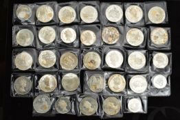 A QUANTITY OF 1997 QUEEN ELIZABETH/PHILIP STERLING SILVER CROWN SIZE COINS, with highlighted