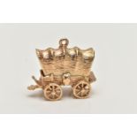 A 9CT GOLD CHARM, yellow gold charm of a wagon with moving wheels, hallmarked 9ct London,