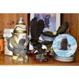 A COLLECTION OF BALD EAGLE ORNAMENTS AND COLLECTOR'S PLATES, comprising an Italian RCR mantel