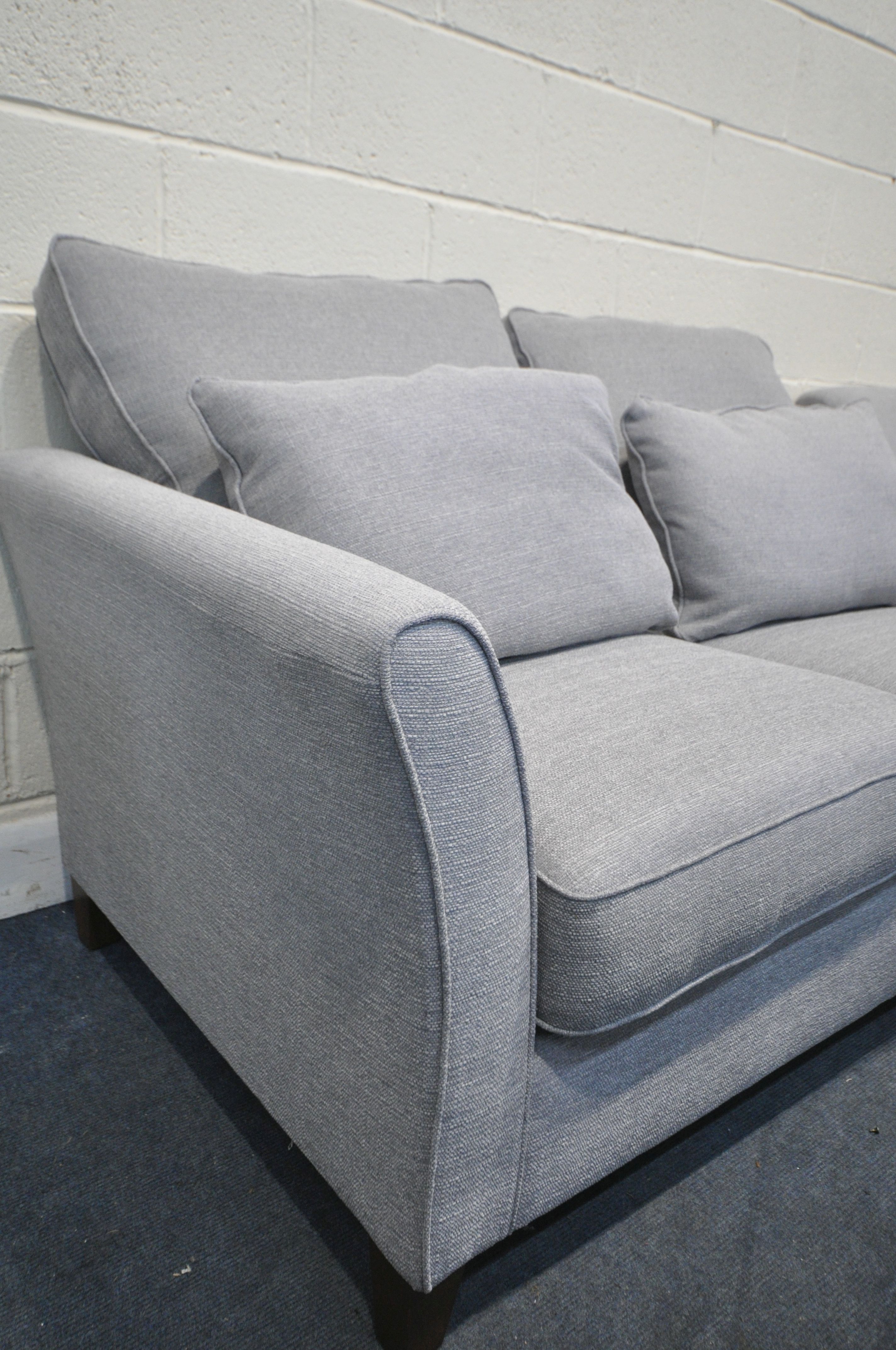 A TWO PIECE GREY UPHOSTERED LOUNGE SUITE, comprising a sofa and armchair (condition:-good - Image 2 of 3