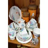 A GROUP OF FOUR PORTMEIRION POTTERY KITCHEN CANNISTERS TOGETHER WITH A ROYAL ALBERT FRIENDSHIP