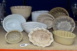 TEN CERAMIC JELLY MOULDS, of varied sizes and designs, to include late Victorian/Edwardian and later