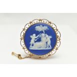 A 9CT GOLD ‘WEDGEWOOD’ CAMEO BROOCH, a blue ‘Wedgewood’ Grecian cameo, set within a yellow gold