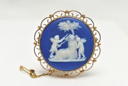 A 9CT GOLD ‘WEDGEWOOD’ CAMEO BROOCH, a blue ‘Wedgewood’ Grecian cameo, set within a yellow gold
