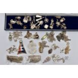 A BAG OF ASSORTED WHITE METAL JEWELLERY, to include a box of assorted charms in various forms such